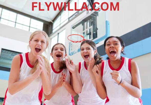 A team of EDC Girls Basketball players celebrating after a game.